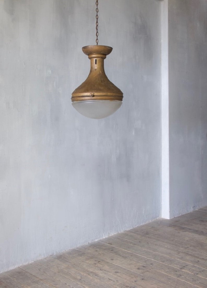 A spun copper pendant light