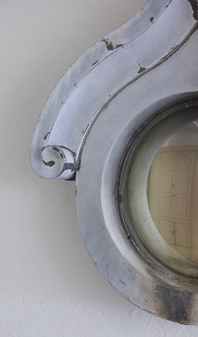 A C19th zinc convex mirror