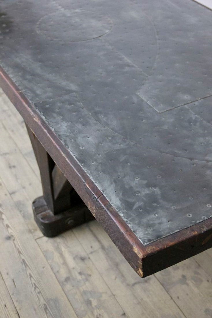 An architectural C19th work table with a patchwork zinc top
