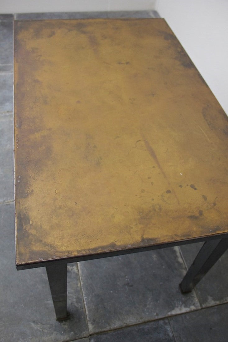 A 1940's brass and steel desk