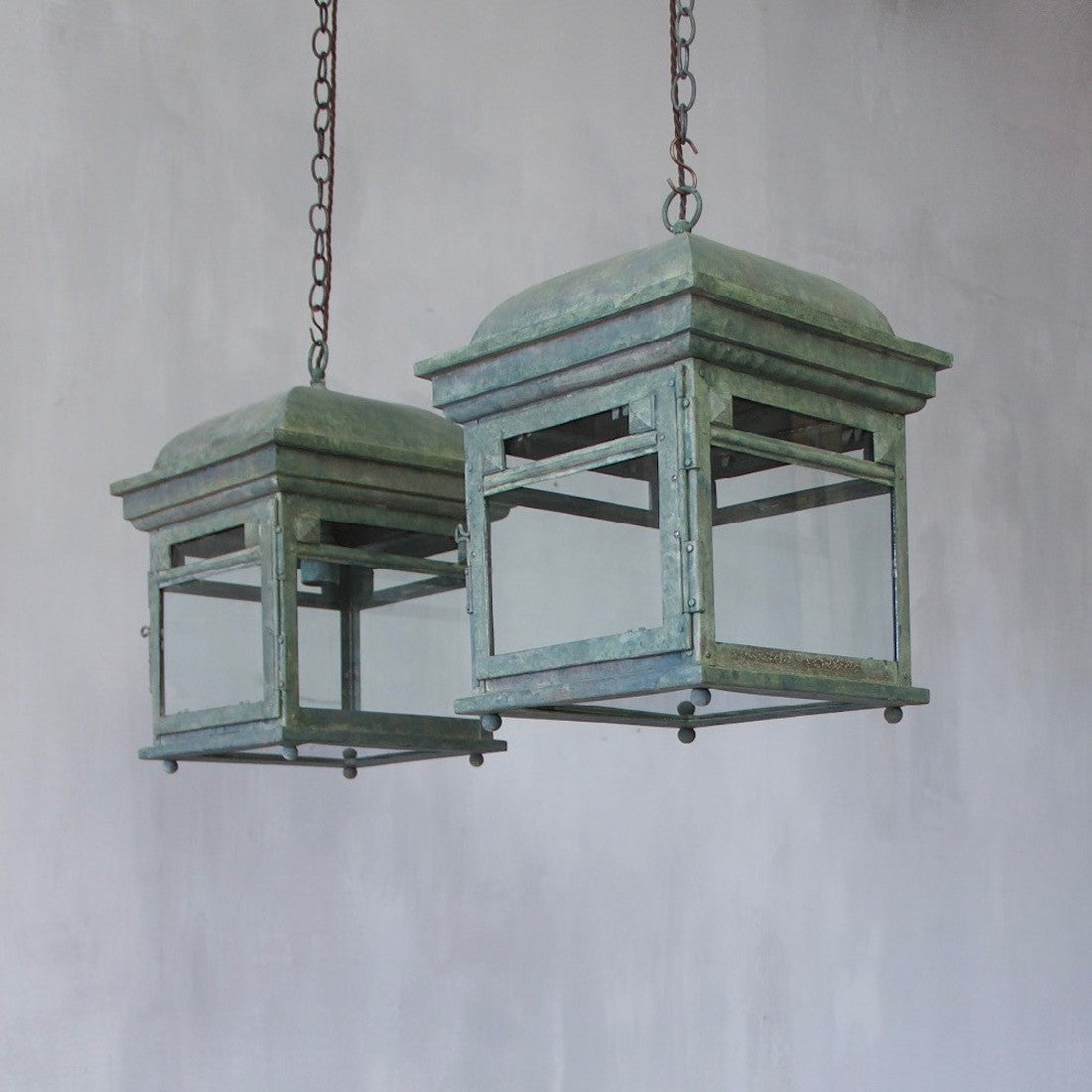 A pair of bronze lanterns