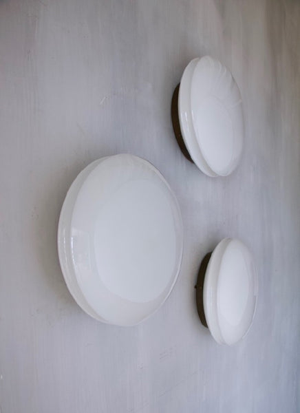 A set of three opaline lights