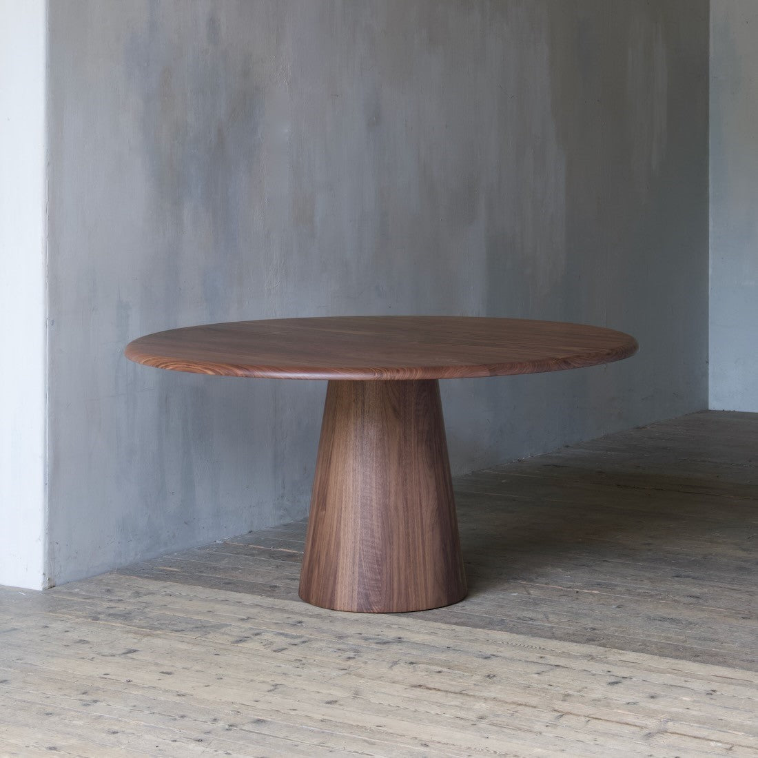 A bespoke pedestal dining table