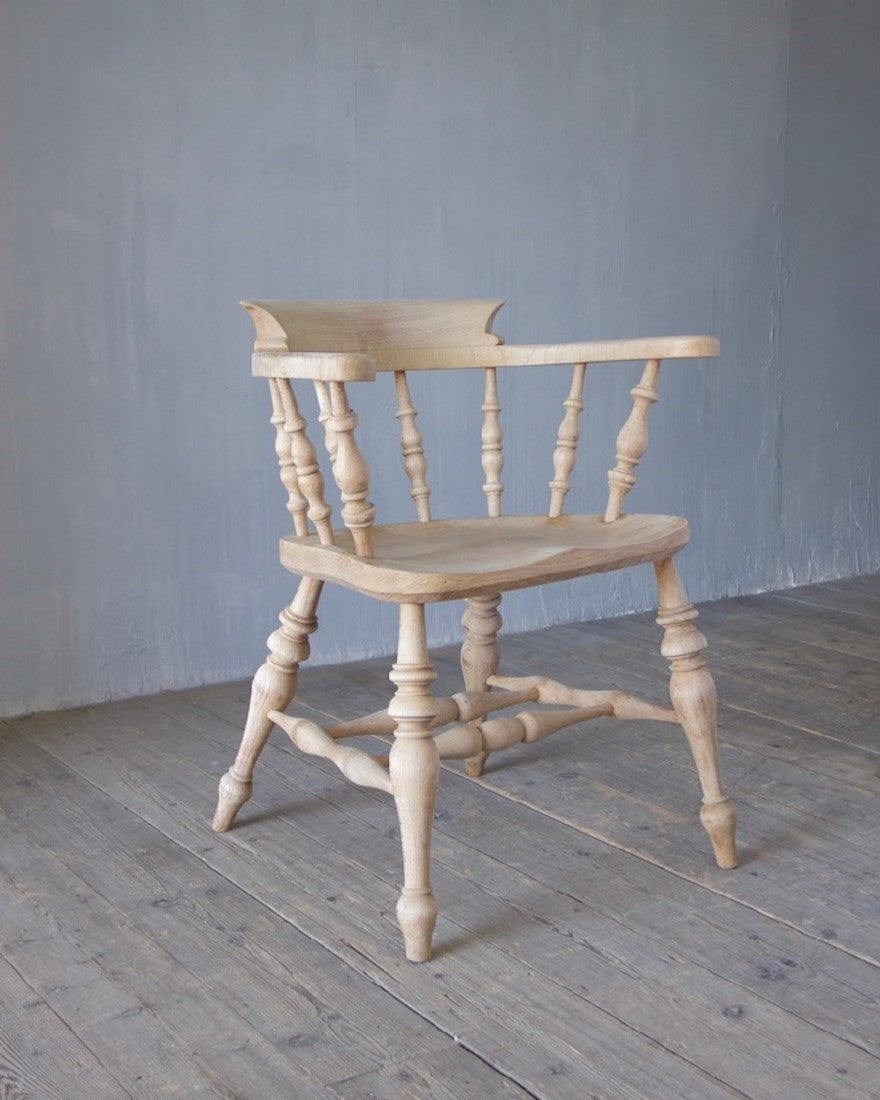 A set of 8 captain's chairs