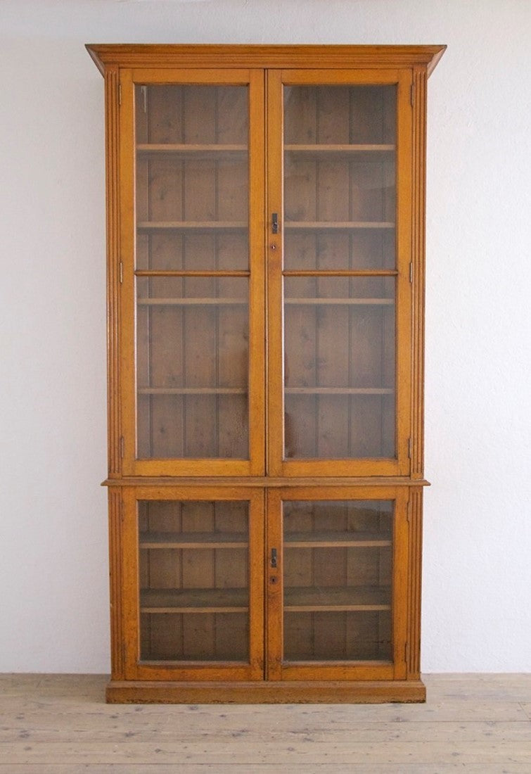 A late C19th oak library cabinet