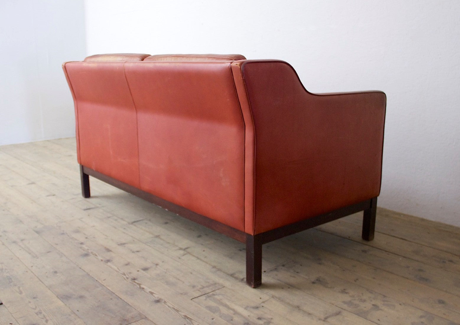 A mid 20th century leather sofa