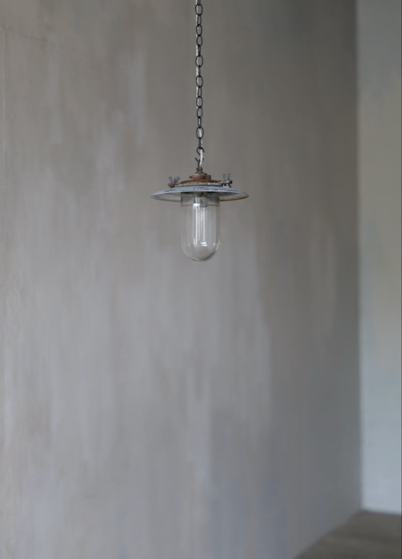 A 1930s iron pendant light