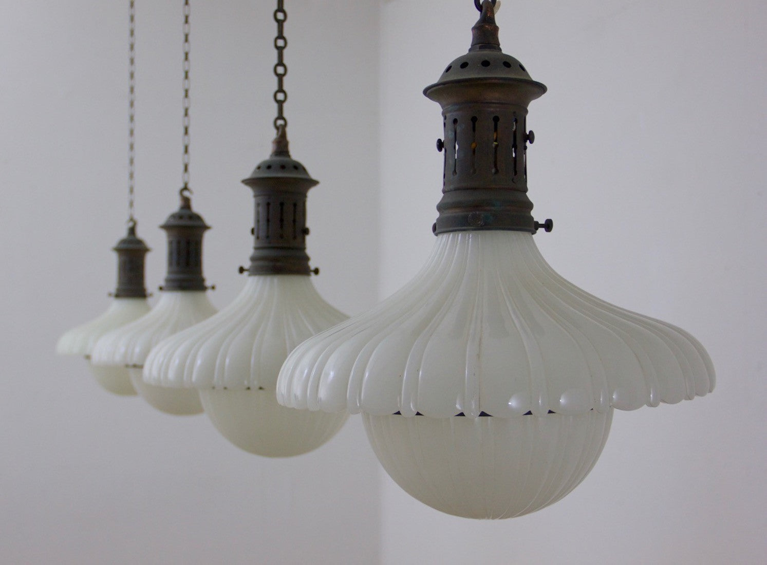 A set of 4 Jefferson pendant lights