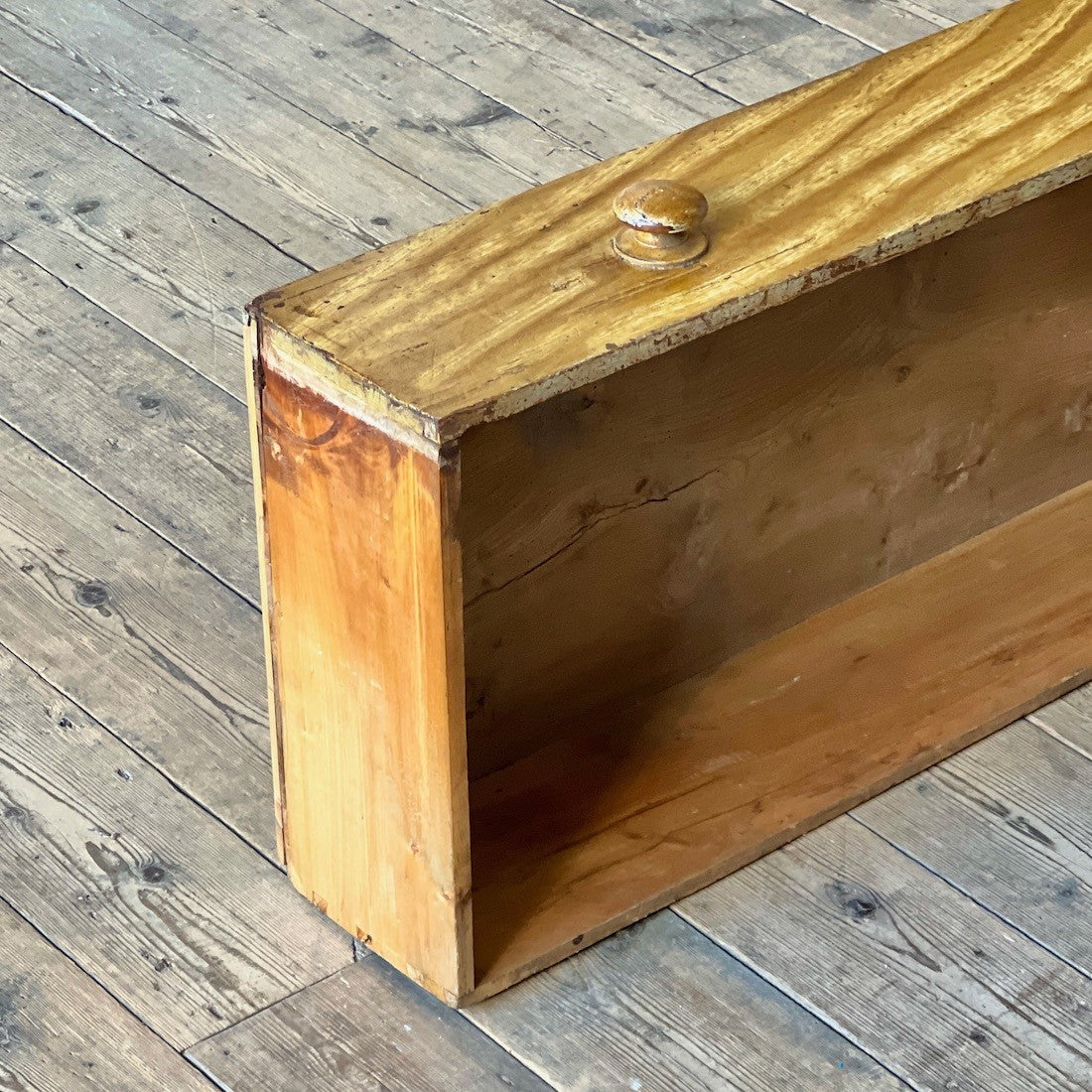 A faux elm painted chest of drawers