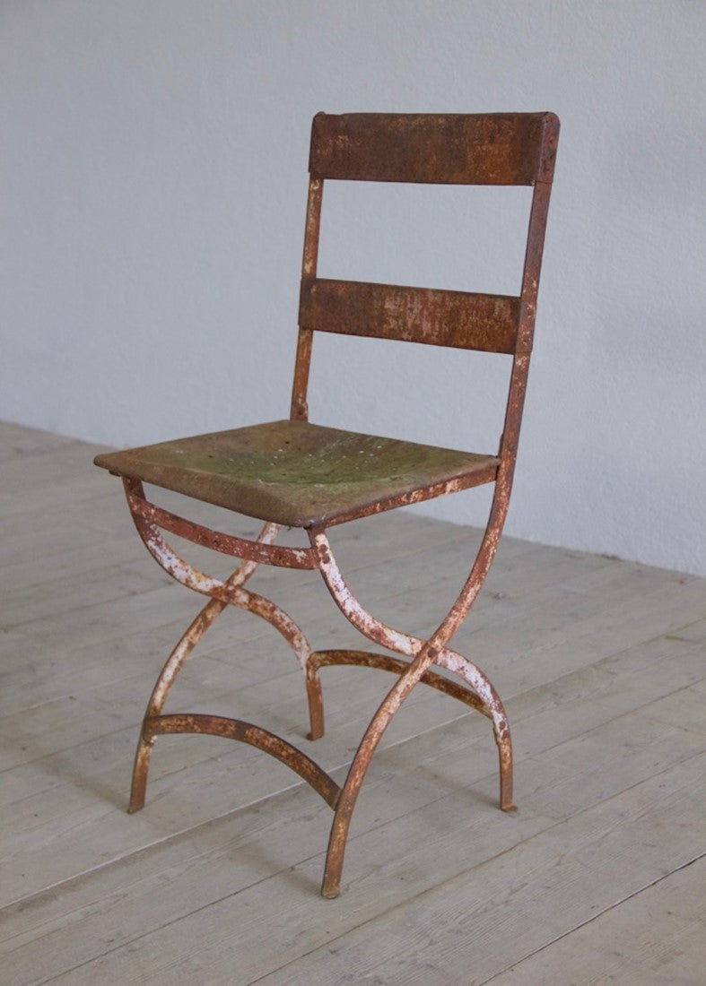 A set of six iron chairs
