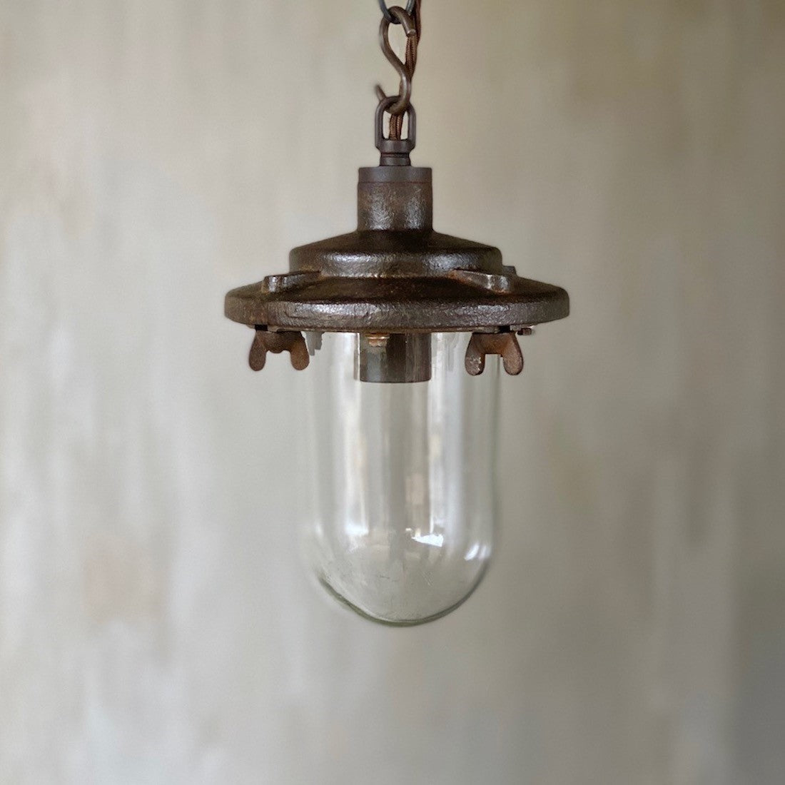 An industrial iron pendant light