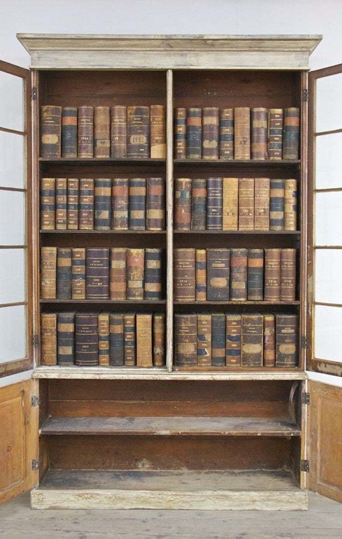 A C19th glazed library bookcase. England c1840