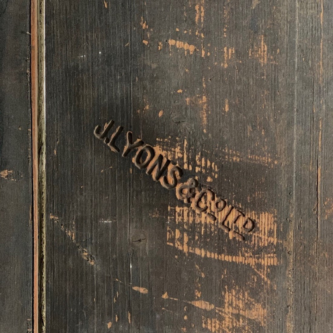 A circular folding J. Lyons & Co. table