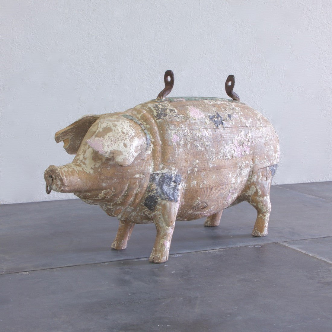A carved wood butcher's sign