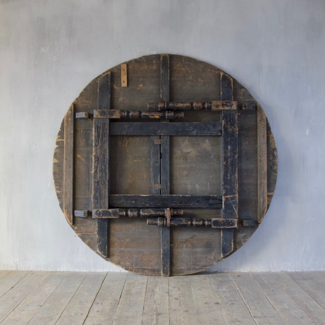 A circular folding J. Lyons & Co. table