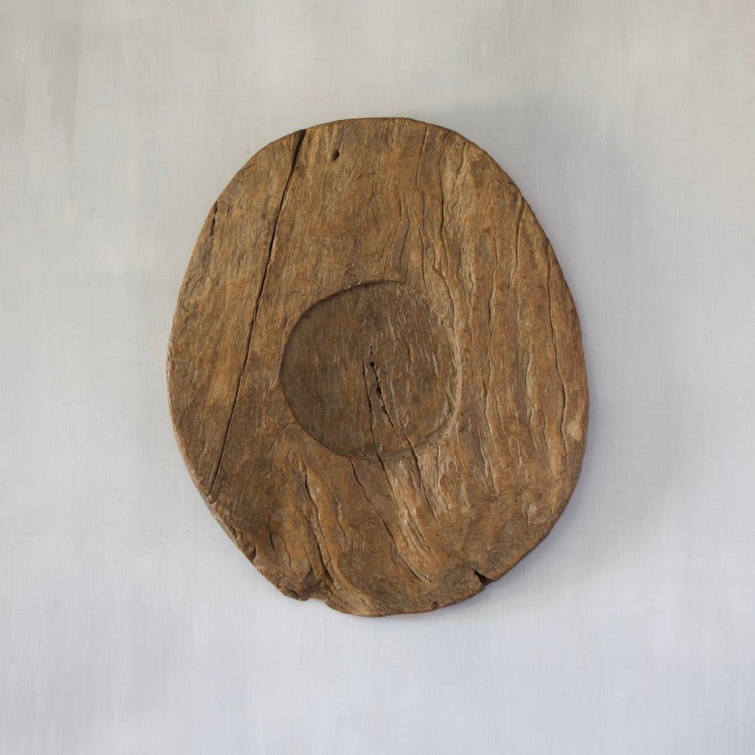 A very large wooden plate