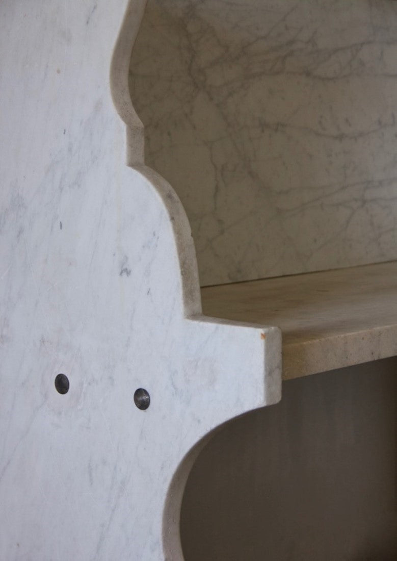 A Carrara marble bench