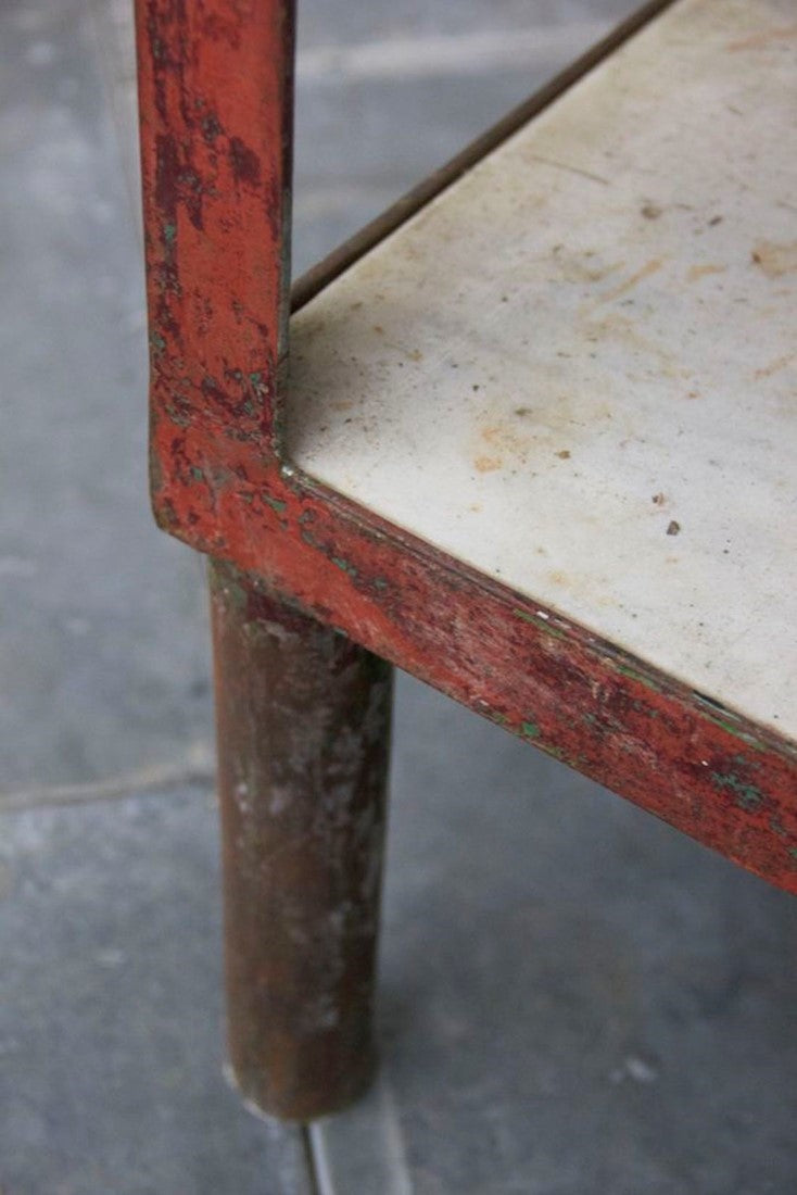 An early C20th iron and marble table