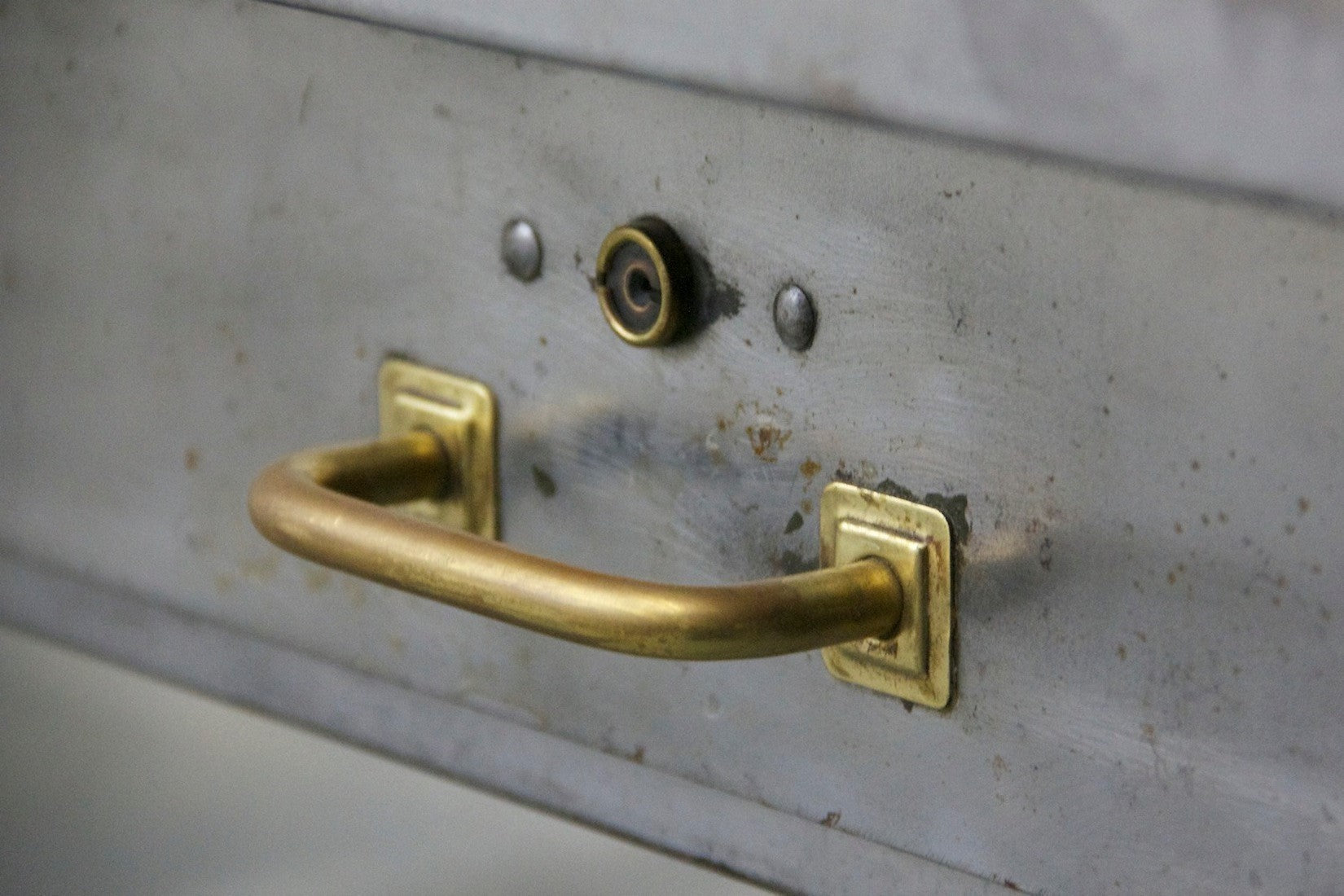 A 1940's brass and steel desk