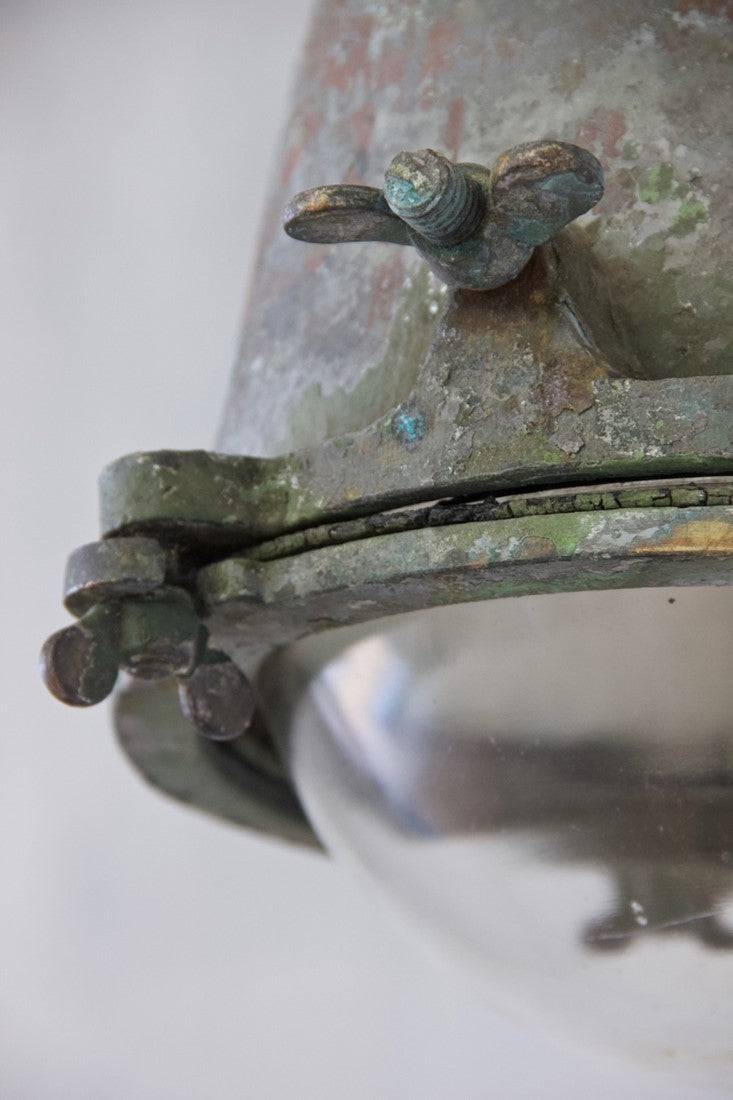 A 1930s copper and brass pendant light