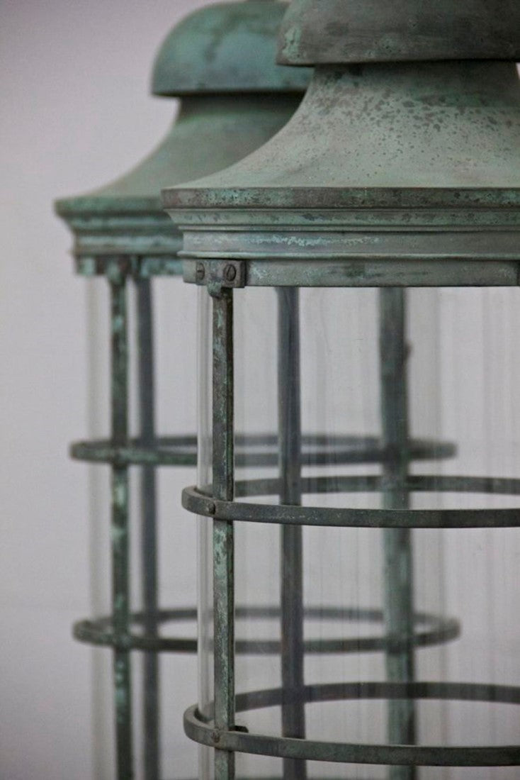 A pair of bronze 1920s lanterns