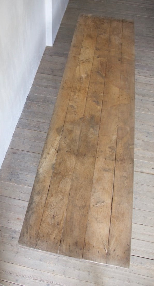 A large chestnut vendange table