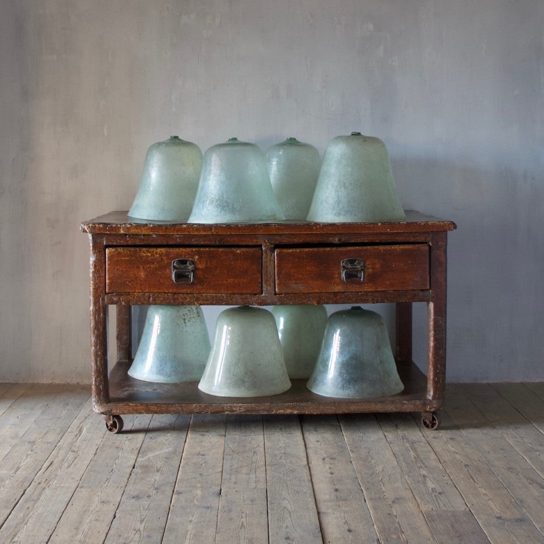 A set of 8 Edwardian glass cloches