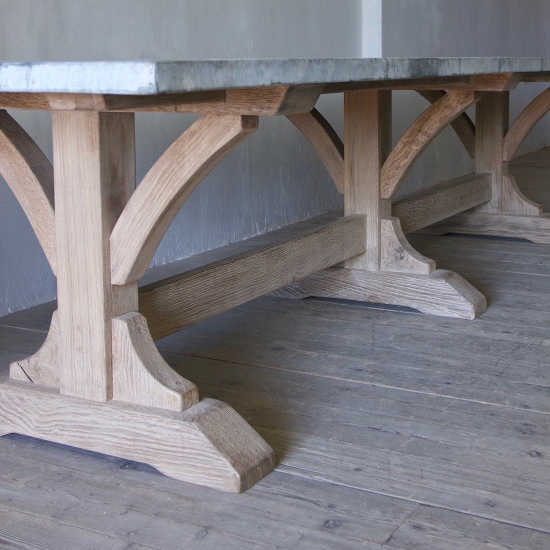 A large and wonderful weathered zinc oak and zinc refectory table