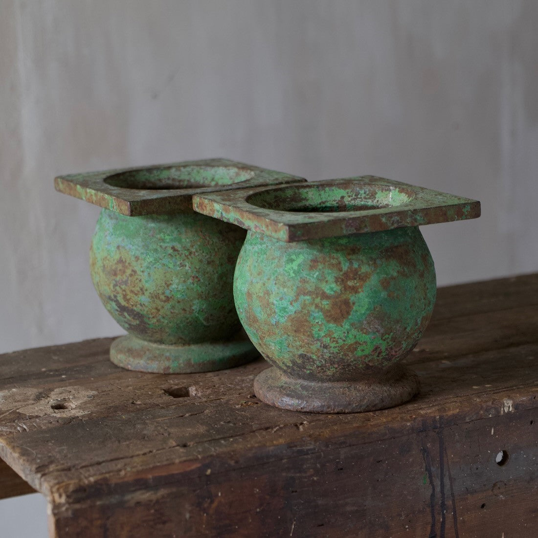 A pair of geometric planters