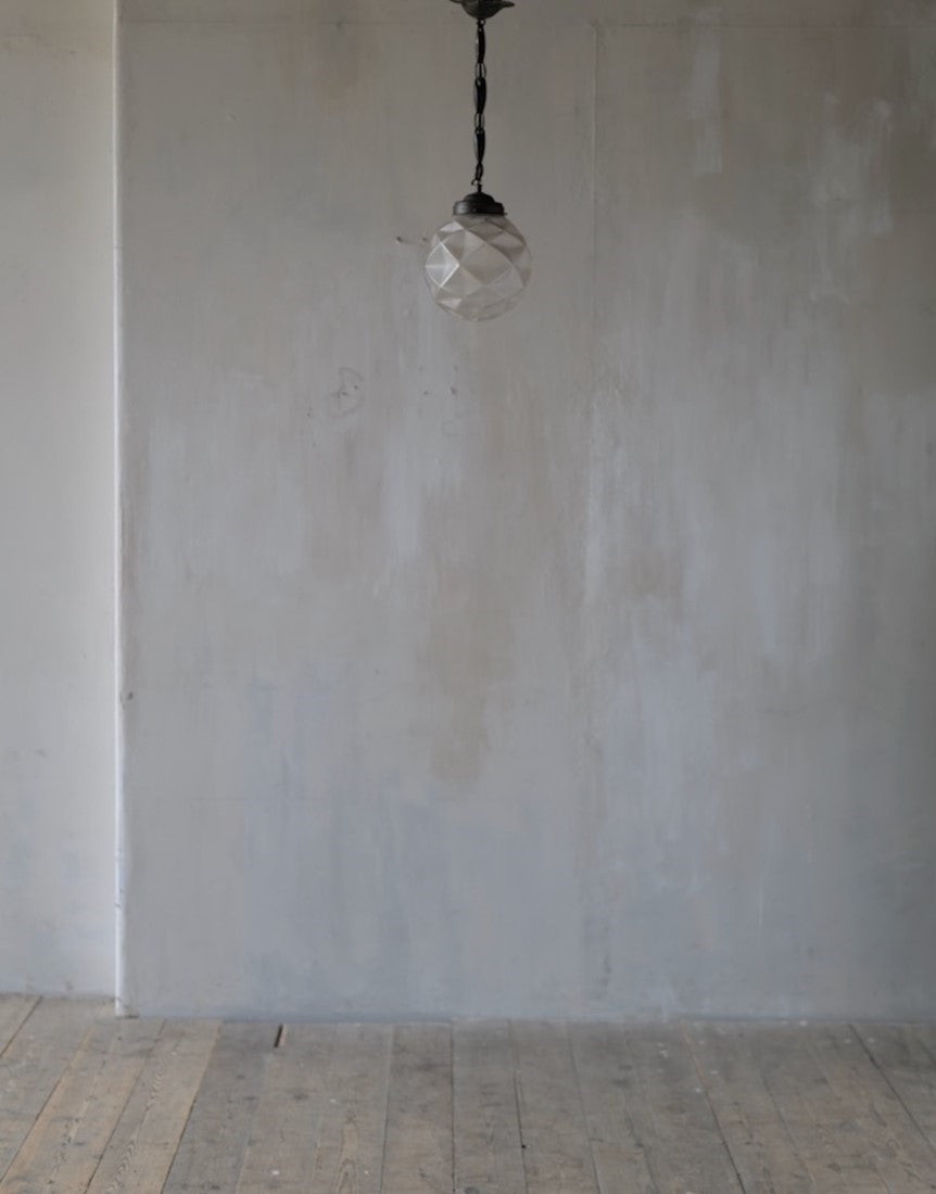 A geometric globe pendant light