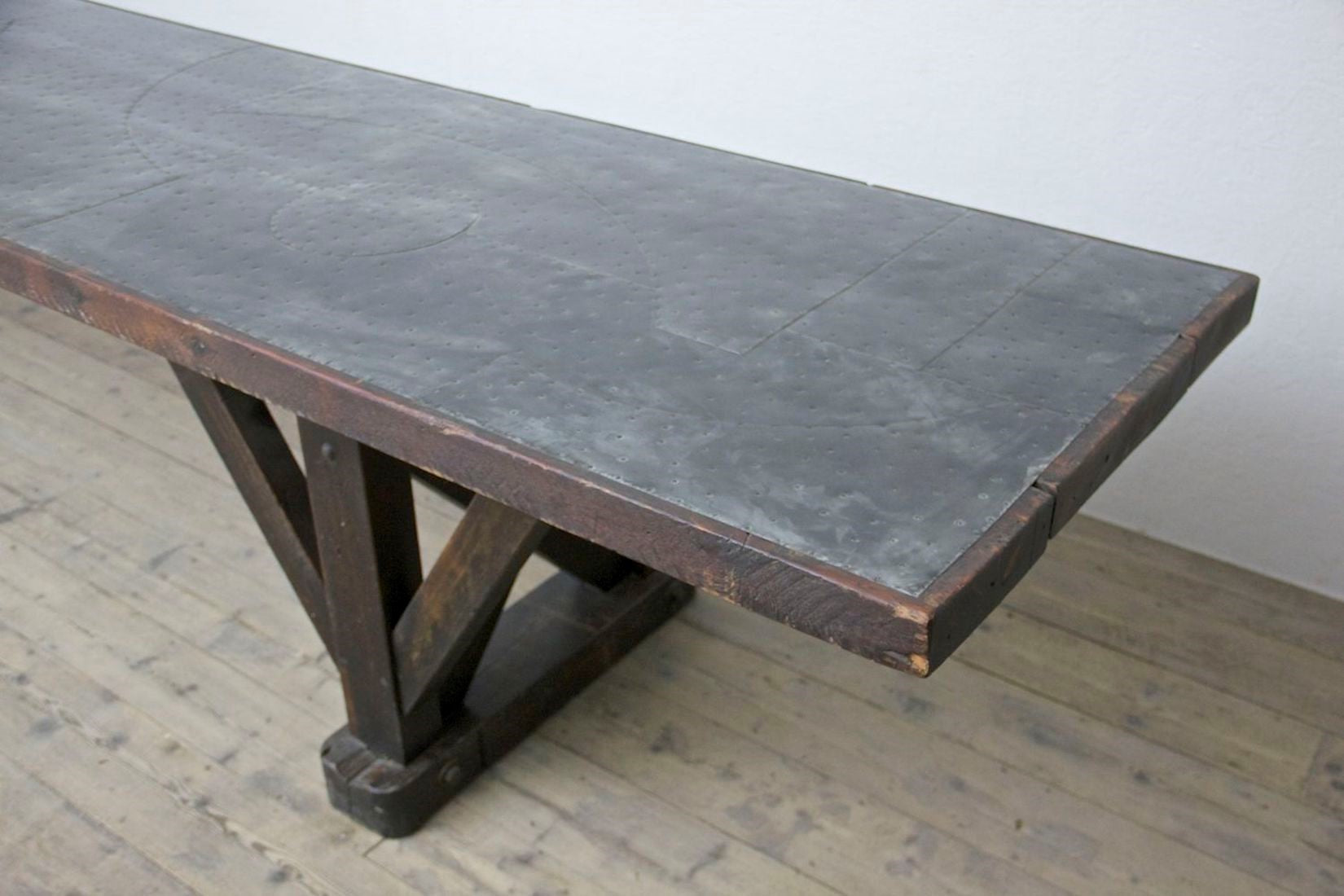 An architectural C19th work table with a patchwork zinc top