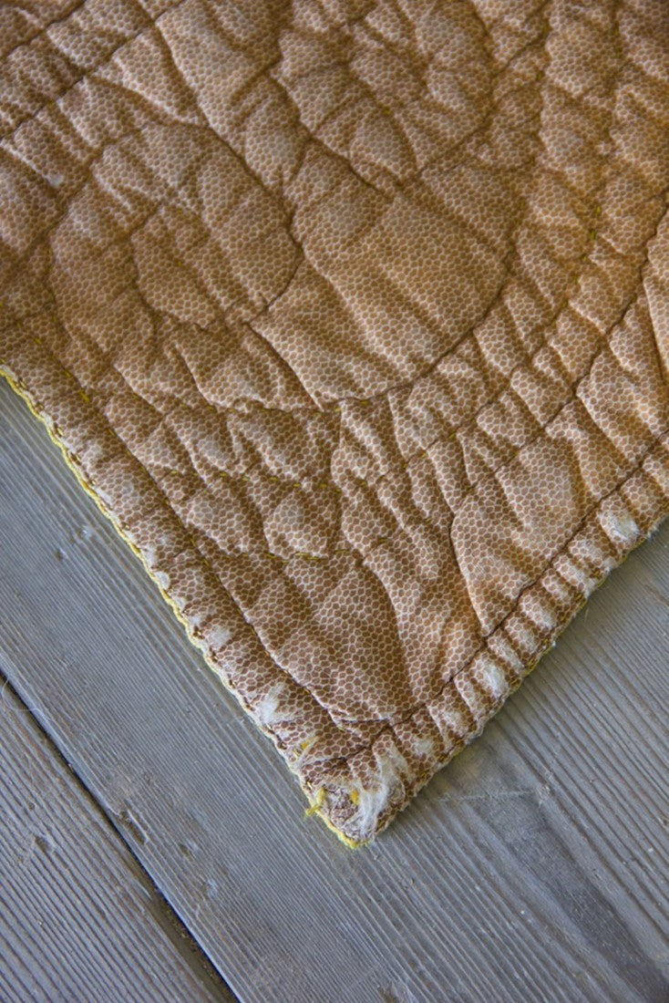A beautiful gold 18th century silk French quilt