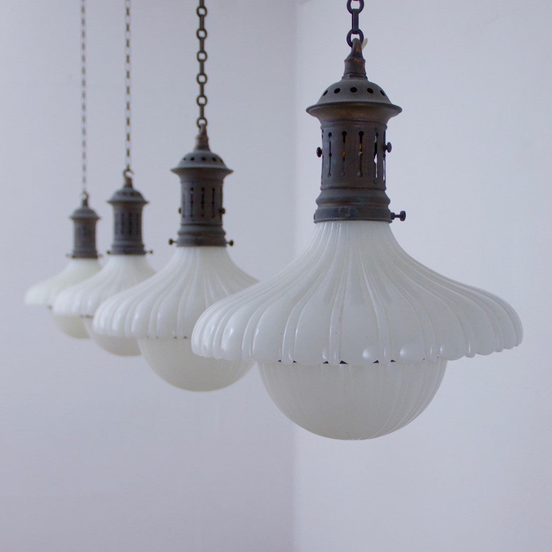 A set of 4 Jefferson pendant lights