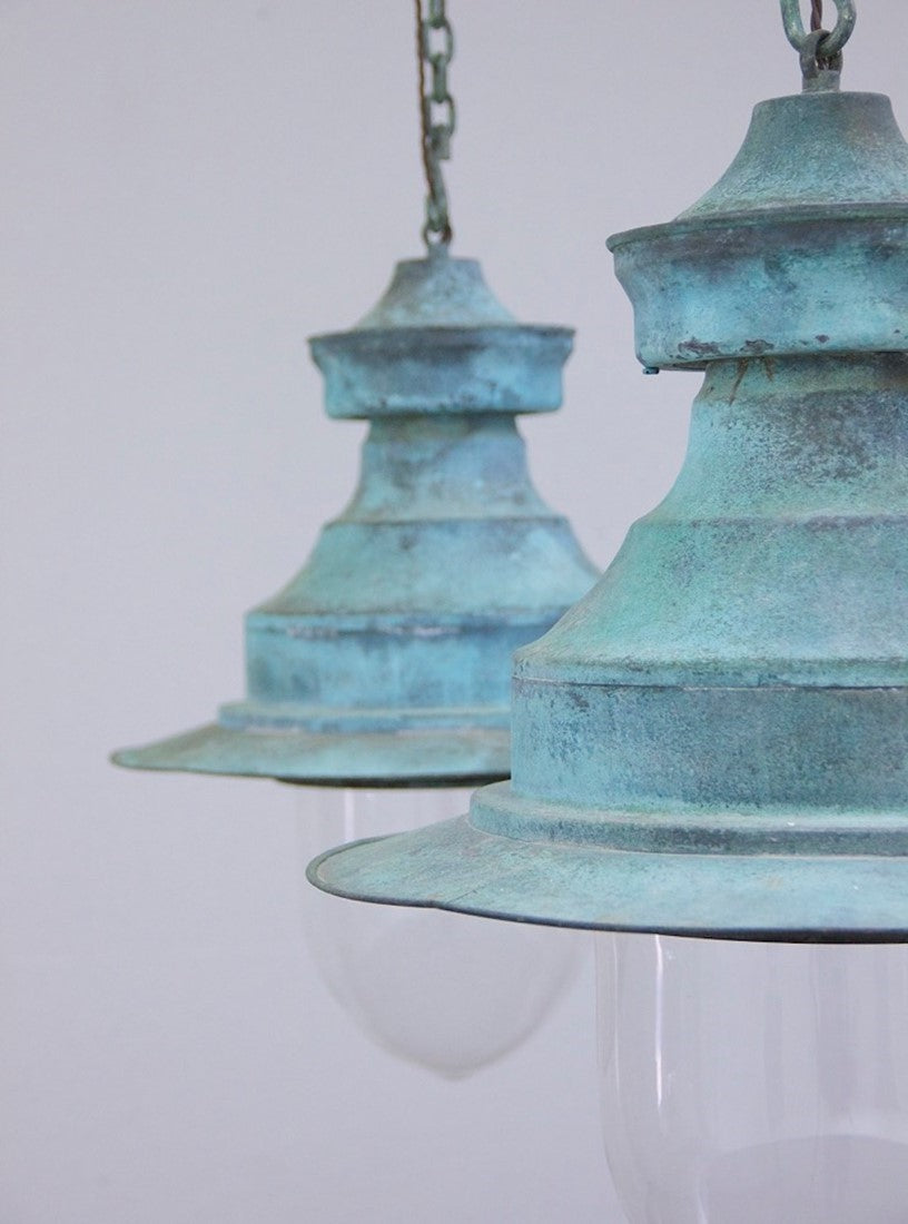 A large pair of copper station lights