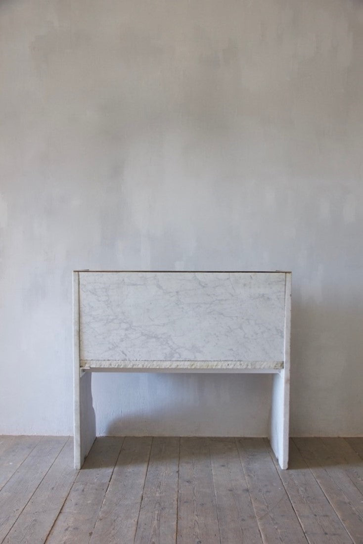 A Carrara marble bench
