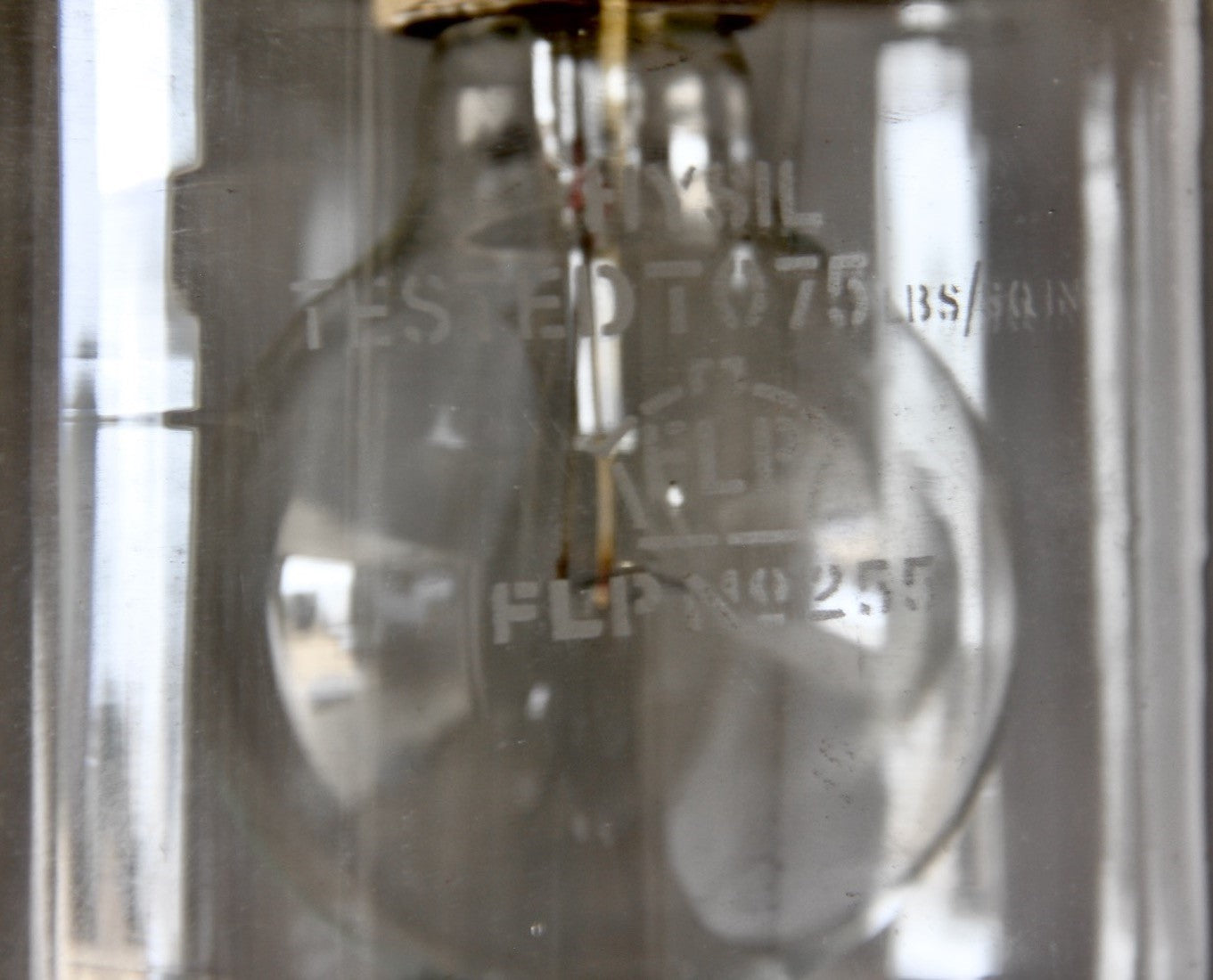 A set of three small industrial pendant lights