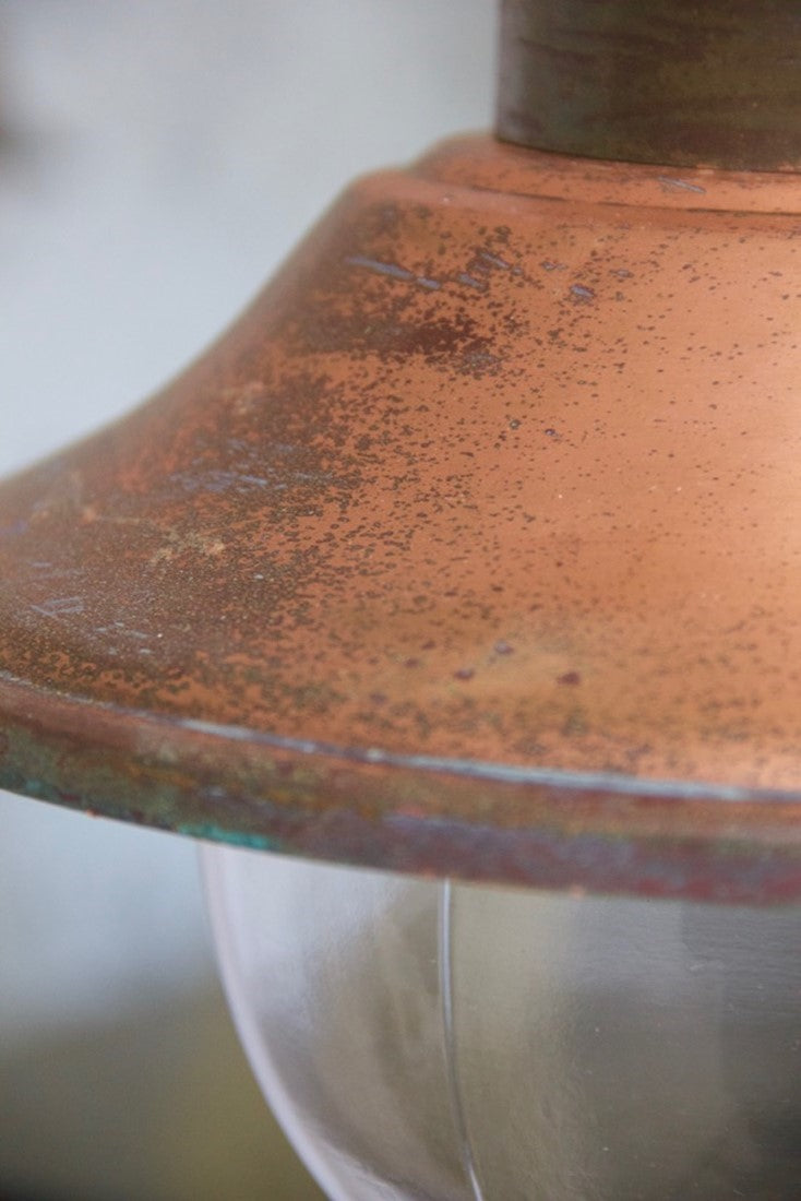 A set of 5 copper pendant lights