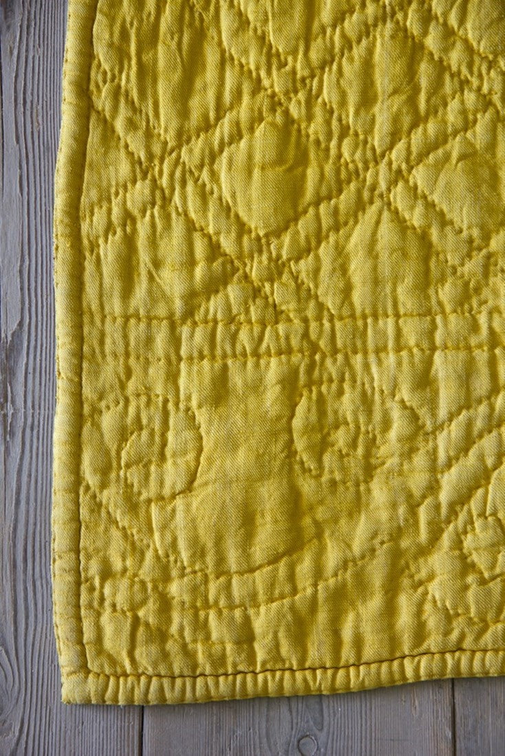 A beautiful gold 18th century silk French quilt