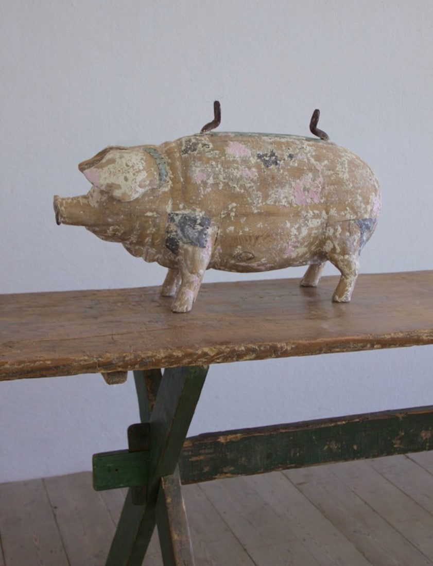 A carved wood butcher's sign