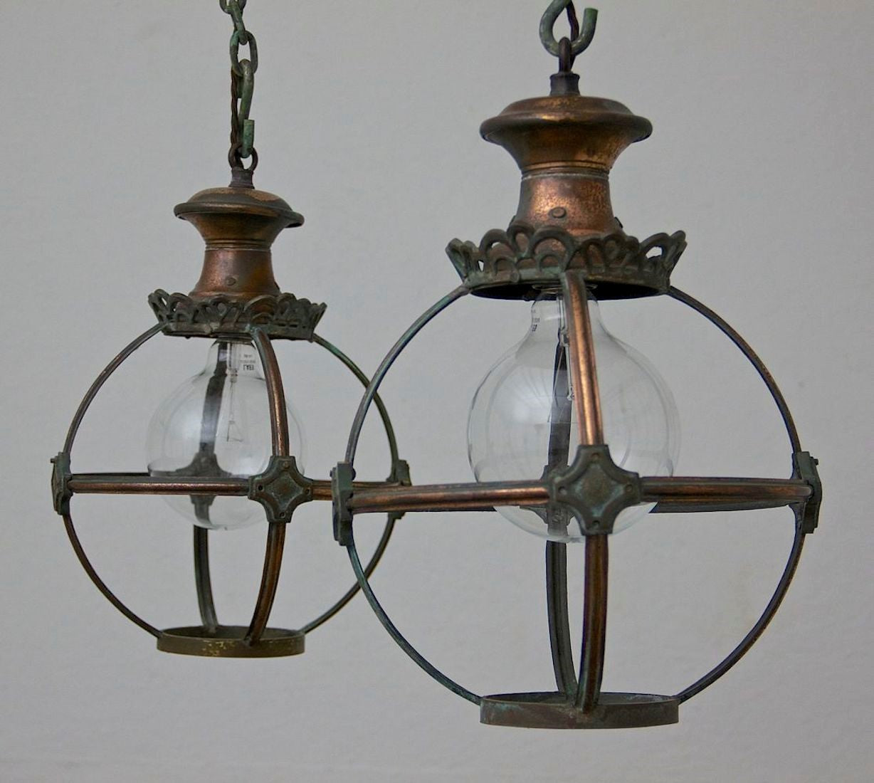 A pair of copper globe lanterns