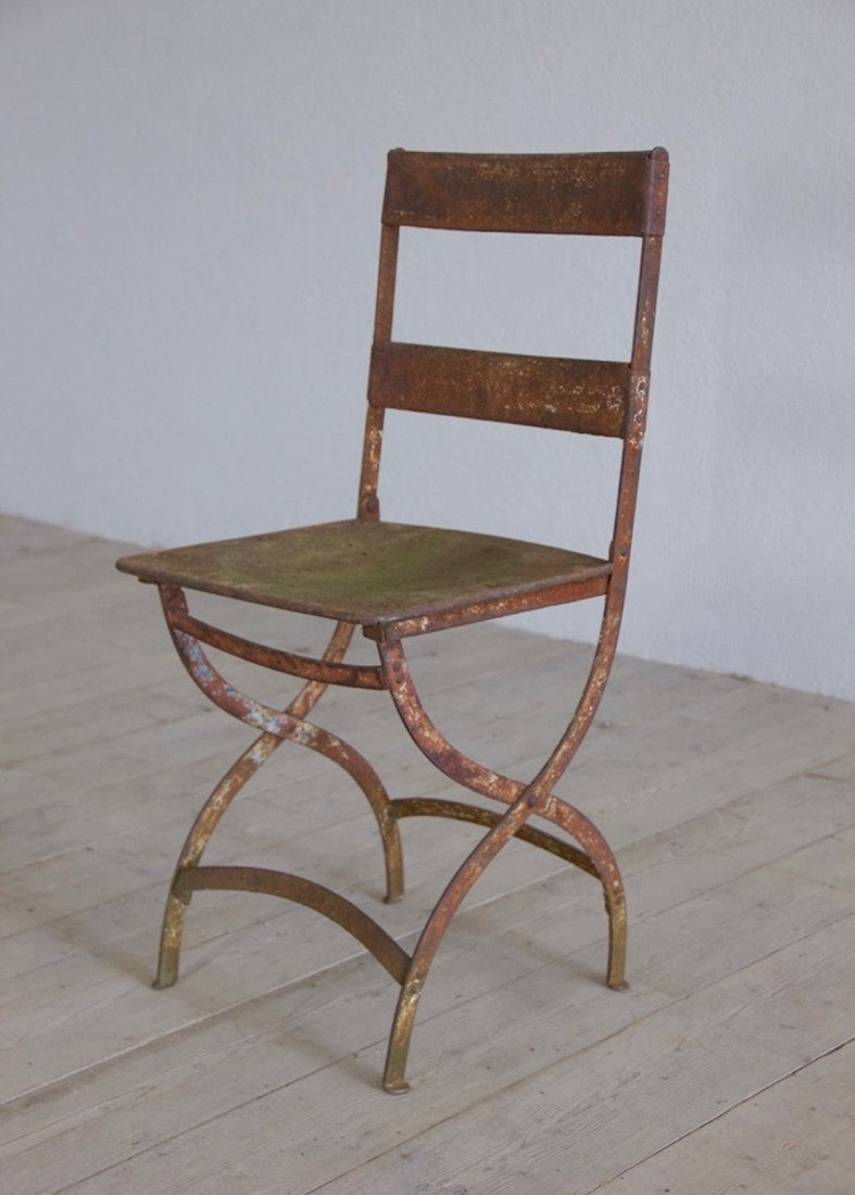 A set of six iron chairs