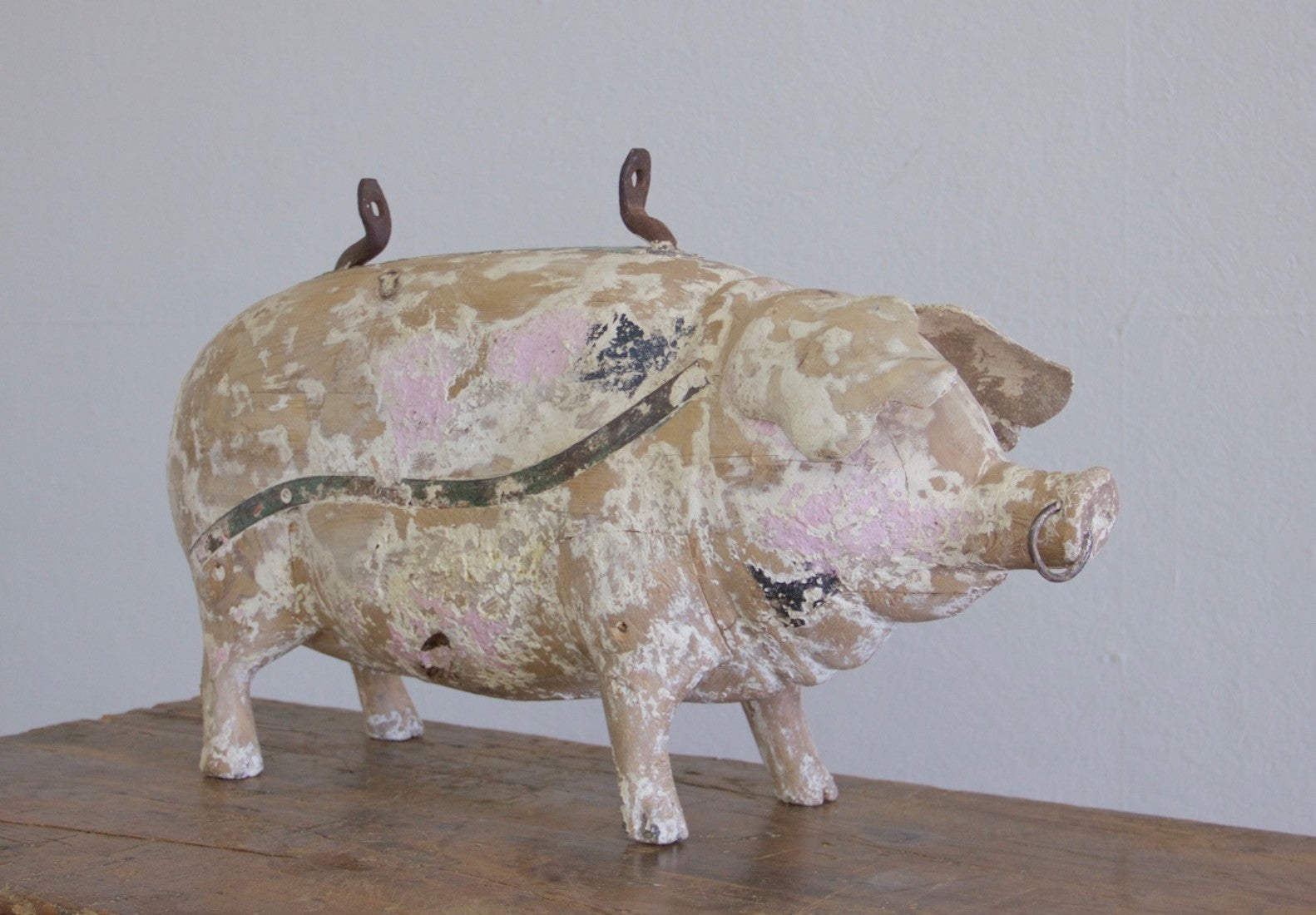 A carved wood butcher's sign