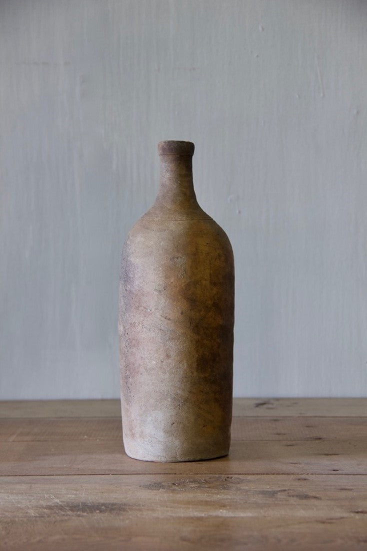 A set of ten clay bottles