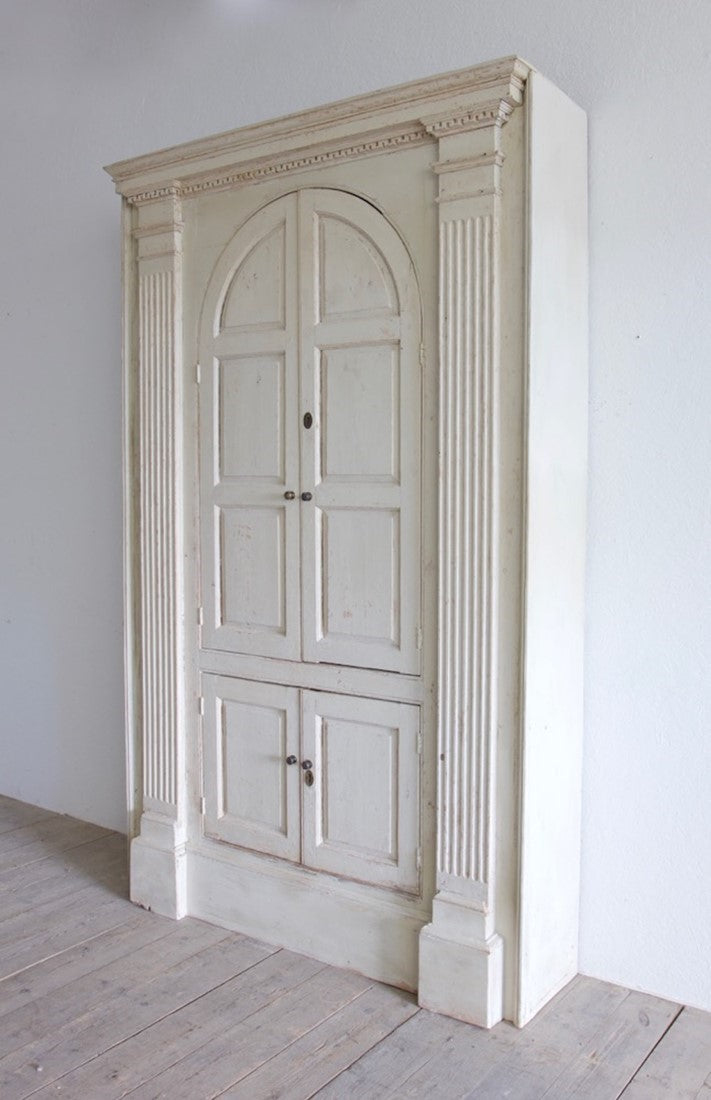 A pair of C18th cupboards