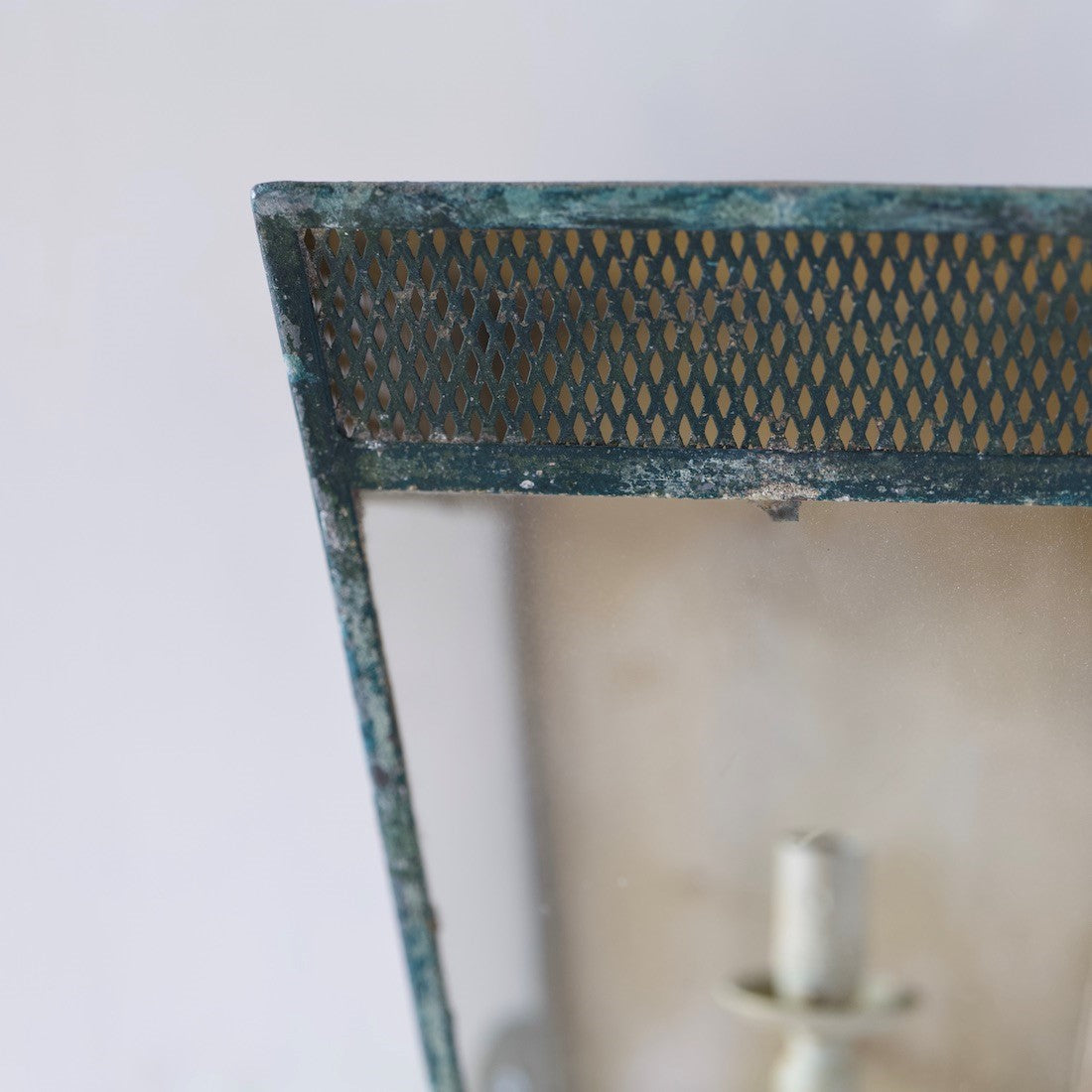 A simple estate-made wall lantern