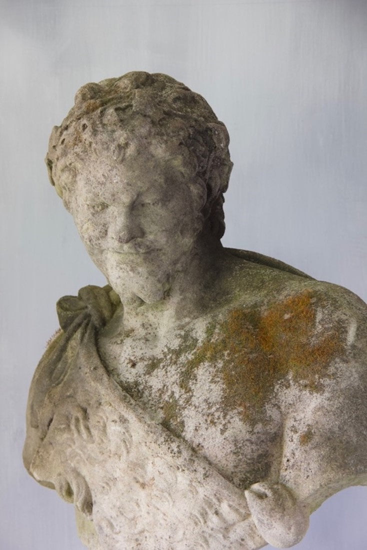 Two classical busts on columns