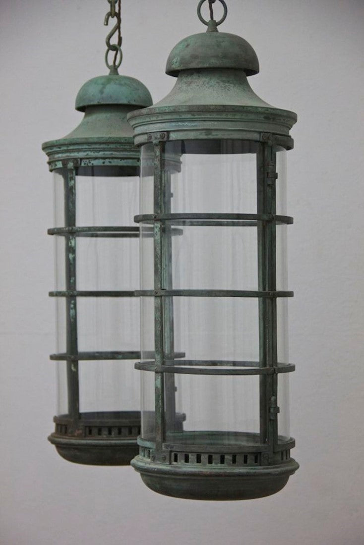 A pair of bronze 1920s lanterns