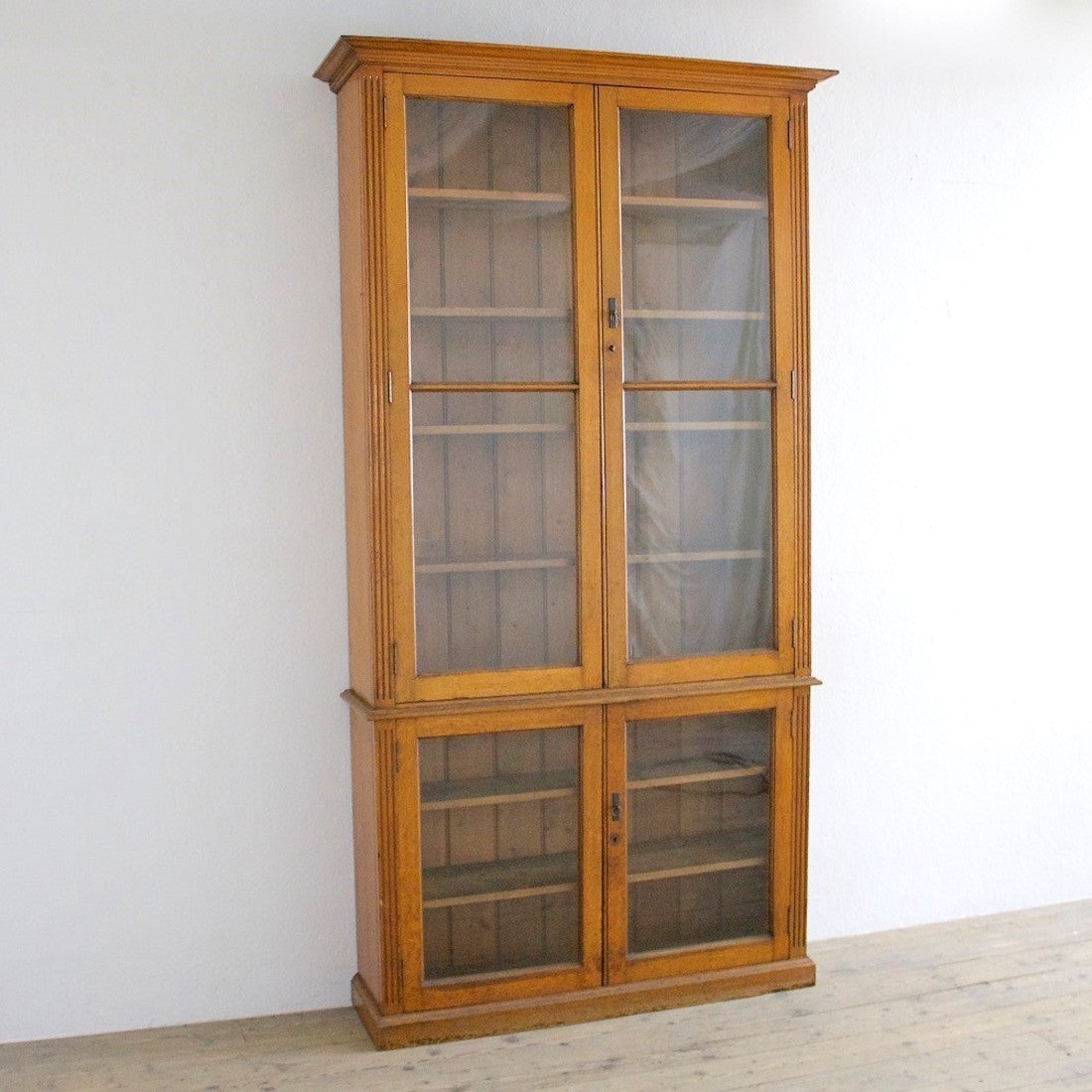 A late C19th oak library cabinet