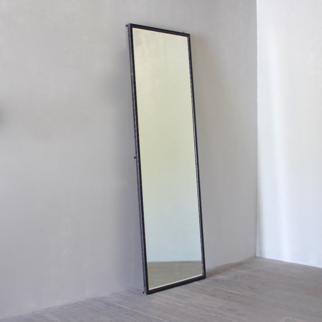 A very large nineteenth century shop mirror