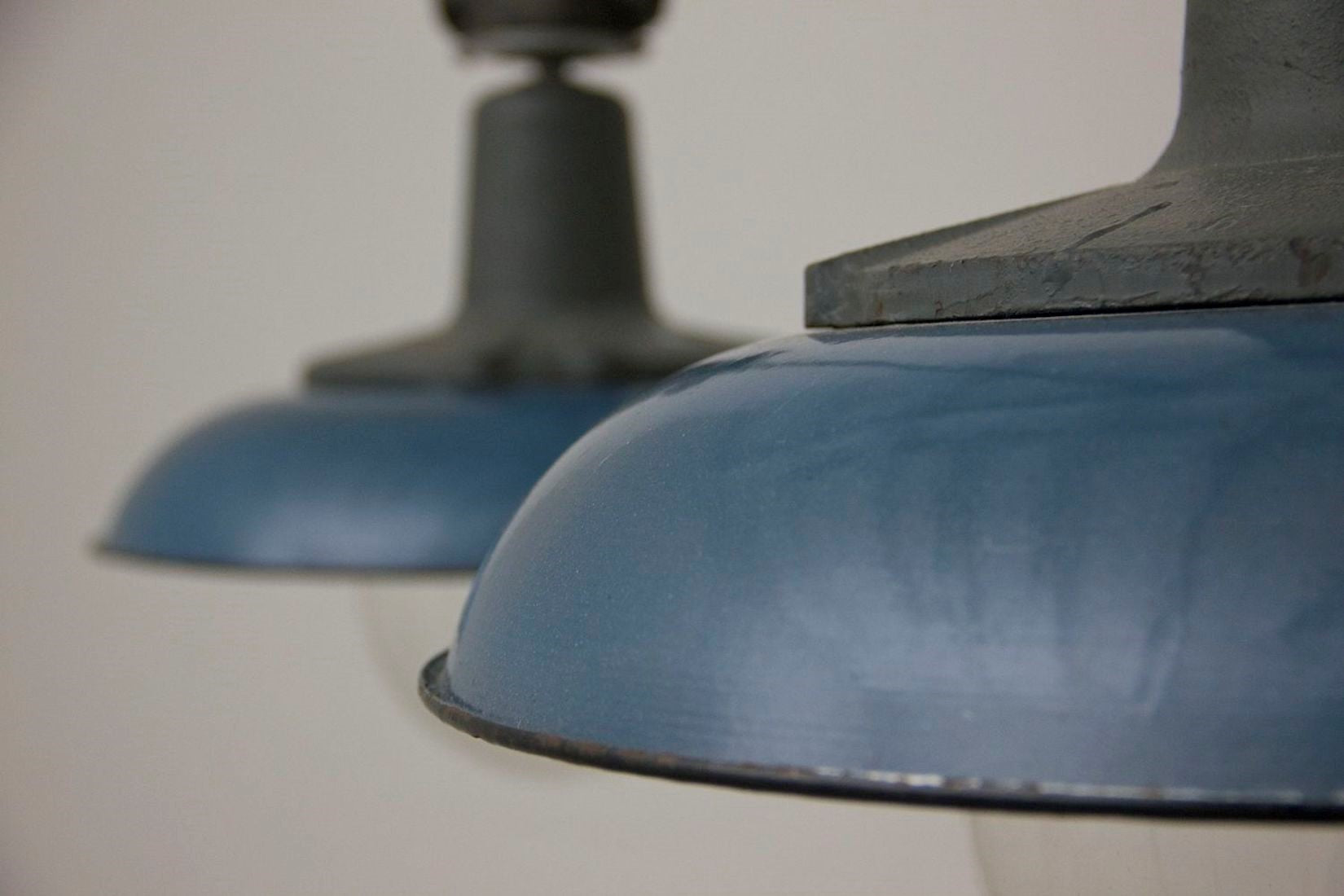 A blue enamelled pendant light (one remaining)
